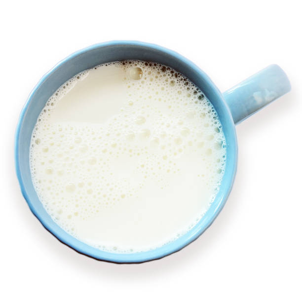 istock Blue cup of fresh frothy milk isolated on a white background. 1068648324