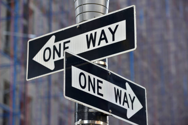 One way street sign n Manhattan One way street sign n Manhattan, New York City, USA one way stock pictures, royalty-free photos & images