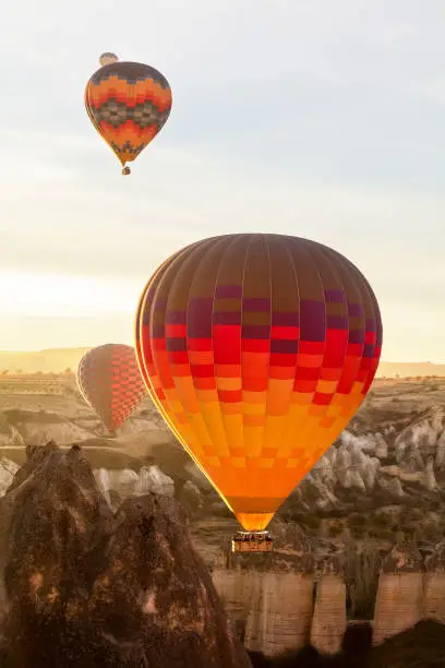 Color balloon. Hot air balloon over mountain landscape. Cappadocia, Turkey.