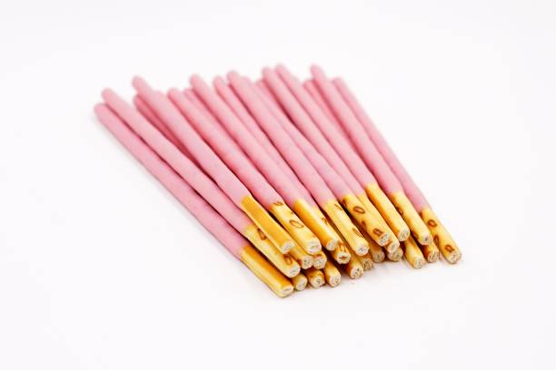 istock Biscuit sticks coated with strawberry flavour confectionery 1068653092