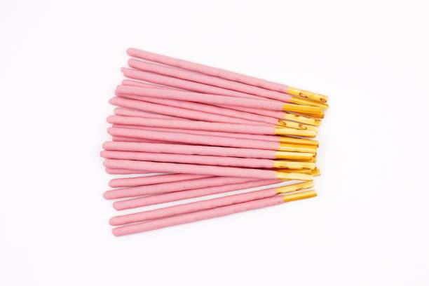 istock Biscuit sticks coated with strawberry flavour confectionery 1068653720
