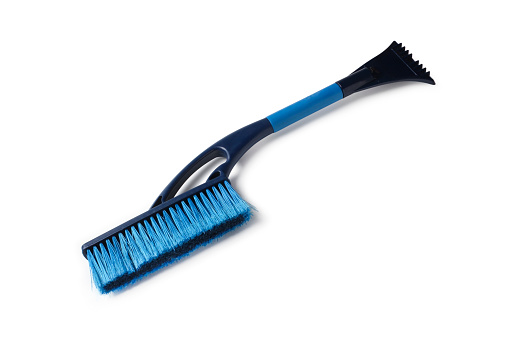 Car brush with scraper for cleaning windows isolated on white background