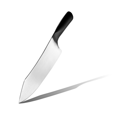 Meat knife making a chopping movement on isolated white background