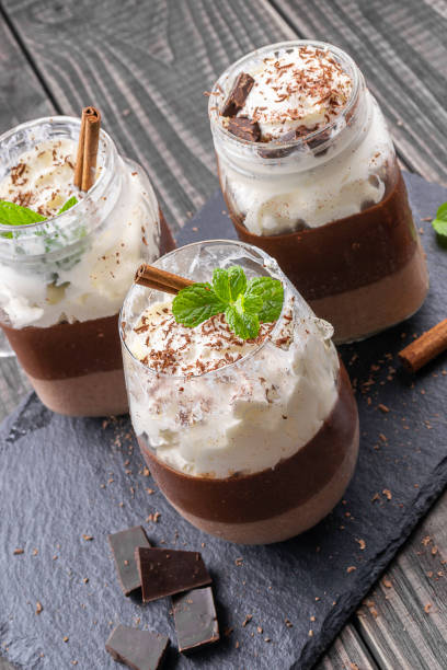 istock Dessert with cinnamon, chocolate and mint. Ice cream. Rustic style 1068682662