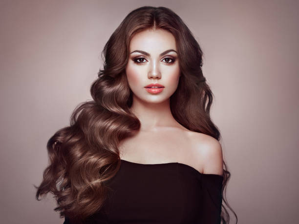 istock Brunette woman with curly hair 1068693388