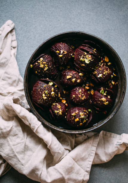 istock Baked whole beet with olive oil, herbs and pistachios 1068700822