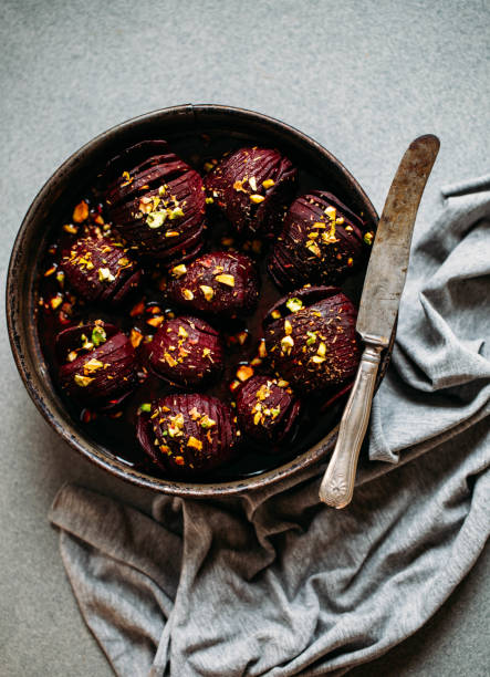 istock Baked whole beet with olive oil, herbs and pistachios 1068700914