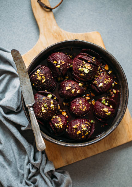 istock Baked whole beet with olive oil, herbs and pistachios 1068700942