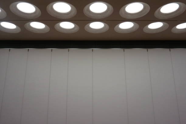 istock modern interior ceiling lights. contemporary theater scene 1068701392