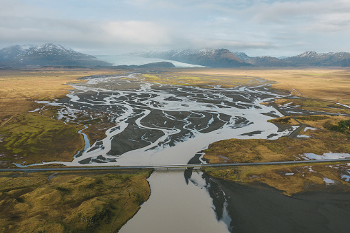 Scenic aerial view of road near the river in Iceland