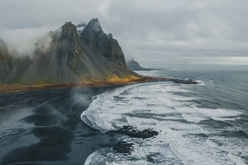 Aerial view of Vestrahorn mountains near the sea in Iceland