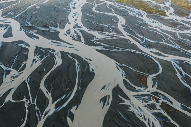 Aerial view of river valley at sunset Scenic aerial view of  river valley in Iceland river system stock pictures, royalty-free photos & images