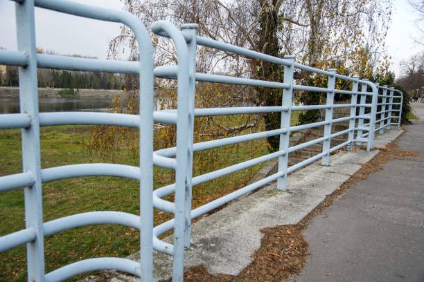 istock Old metal railing in the park. Blue color. 1068718990