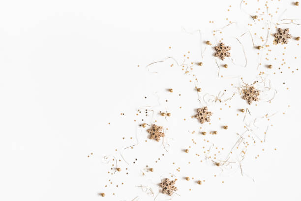 istock Christmas composition. Christmas golden decorations on white background. Flat lay, top view, copy space 1068719894