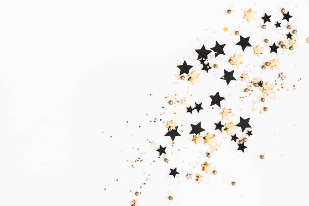 istock Christmas composition. Christmas golden and black decorations on white background. Flat lay, top view, copy space 1068721760