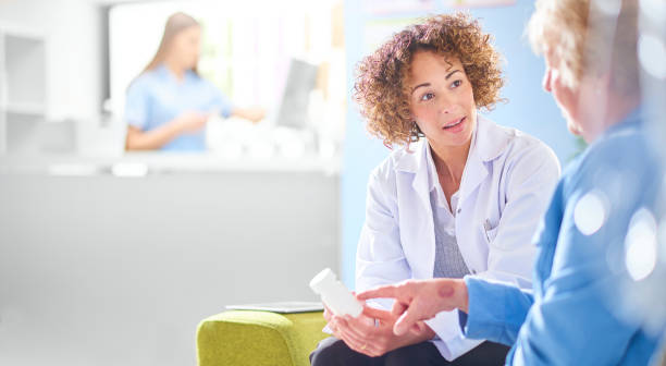 istock patient discussing medication with pharmacist 1068721824