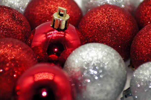 istock Festive background of red silver Christmas tree ball 1068724314