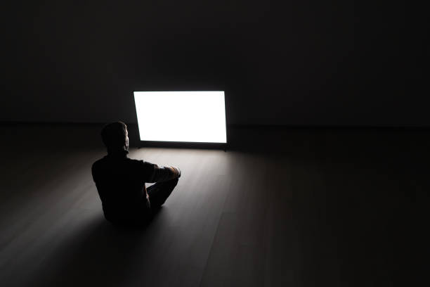 istock The man sitting on the floor in front of a white screen 1068733172