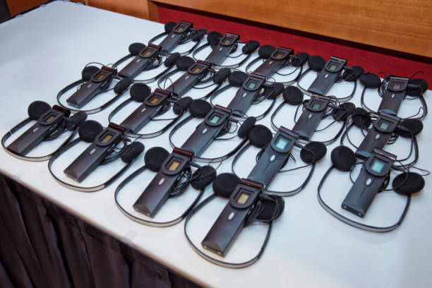 istock headphones used for simultaneous translation equipment simultaneous interpretation equipment . A set of headphones for simultaneous translation during negotiations in foreign languages. 1068733270