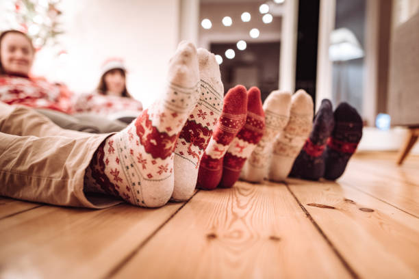 istock friends lying down at home for christmas 1068735498