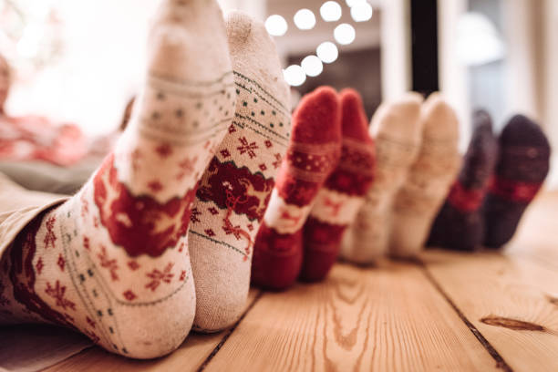 friends lying down at home for christmas