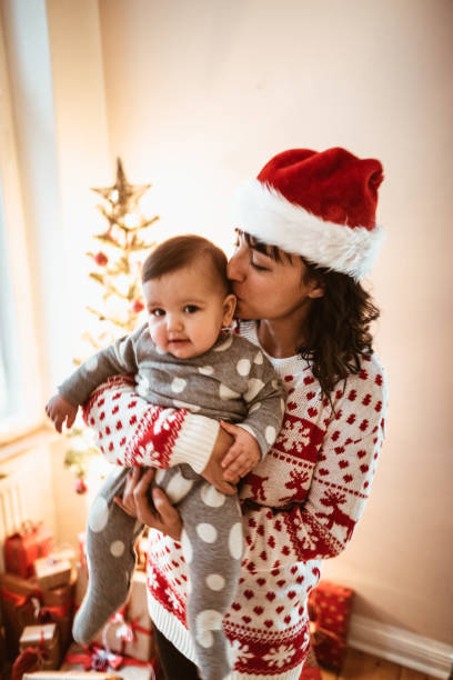 istock mother with daughter portrait at christmas 1068739018