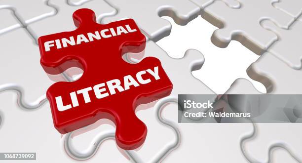 Financial Literacy The Inscription On The Missing Element Of The Puzzle Stock Photo - Download Image Now