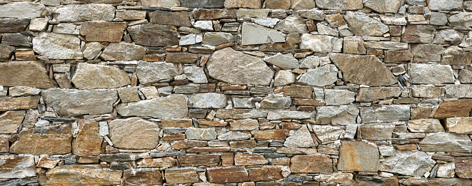 Wall texture of old stone house in Küçükköy Ayvalık, Turkey