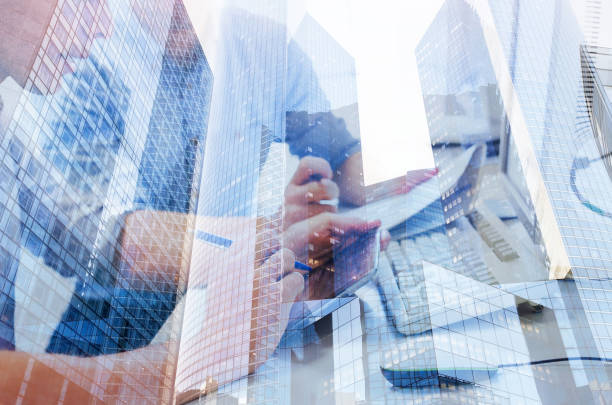 istock business people coworkers working on marketing plan, double exposure 1068740934
