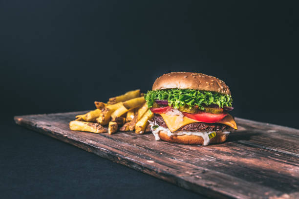 istock Delicious burger on wood 1068741226