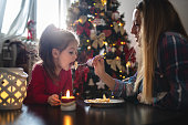 istock Little girl having fun on Christmas 1068750374