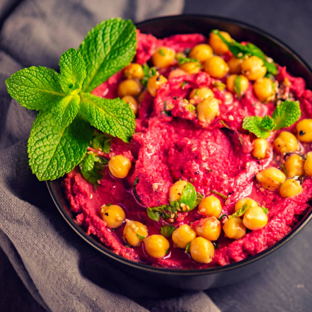 istock Delicious Shot of Beetroot Hummus 1068755364