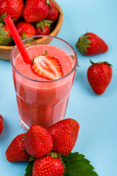 istock fresh strawberrysmoothie or milkshake on a delicately blue background 1068759098