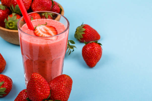 istock fresh strawberrysmoothie or milkshake on a delicately blue background 1068760258