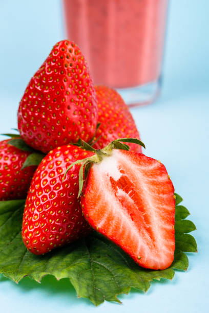 istock fresh strawberrysmoothie or milkshake on a delicately blue background 1068760610