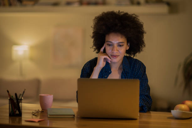 istock Girl looking at laptop 1068760832