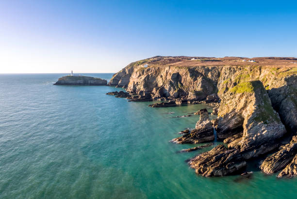 istock Aerial view of the beautiful cliffs close to the historic South Stack lighthouse on Anglesey - Wales 1068761130
