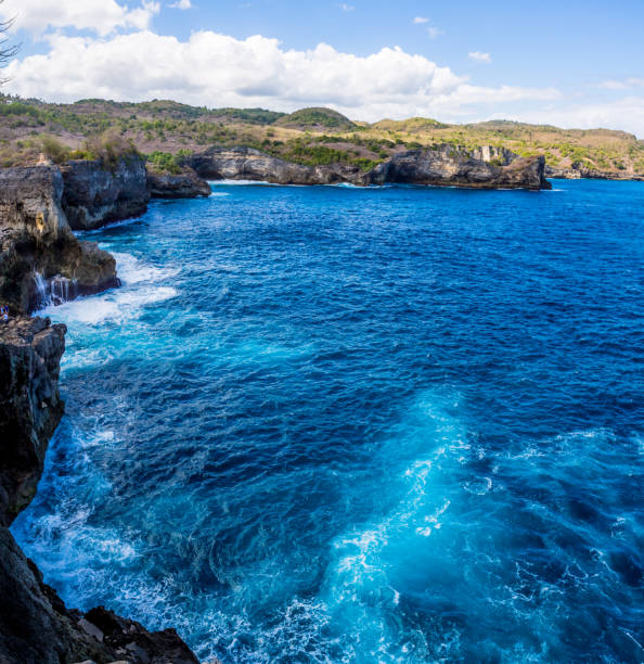 istock Sea Waves Over Rocky Sea. Aerial view 1068764512