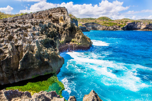 istock Crashing blue and white  sea waves. 1068765828