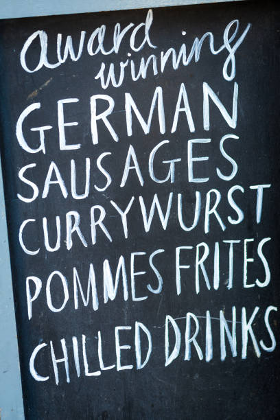 istock Blackboard Sign advertising German Sausages and Currywurst 1068769042