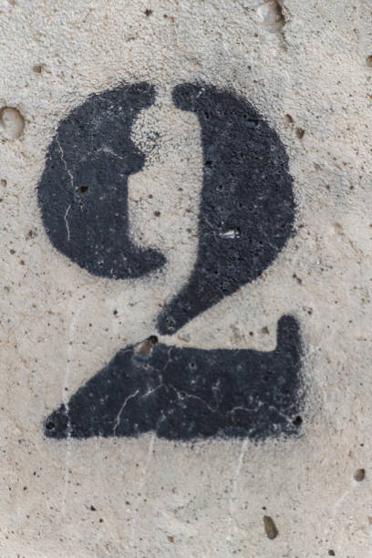 istock number two painted stencil on concrete wall 1068775226