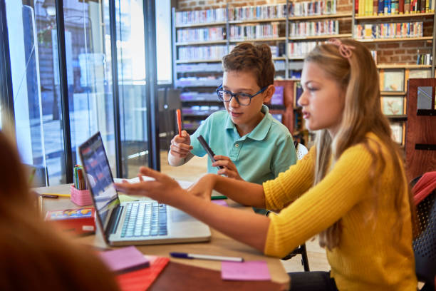 istock group of friends studying together in the library 1068775958