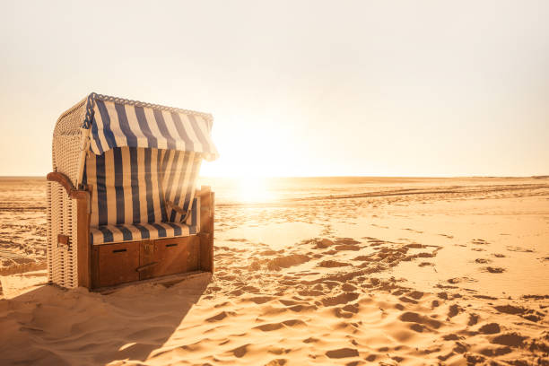 Beach chair Beach chair in the sun amrum stock pictures, royalty-free photos & images