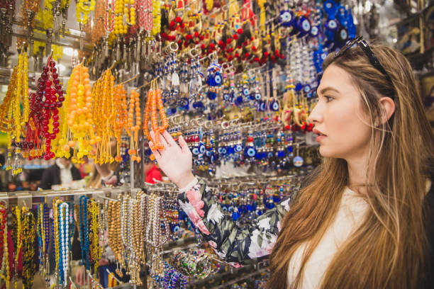 istock Young women buying colorful souvenir 1068780946