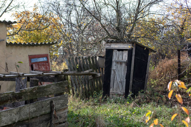 istock Old wooden privy in russia 1068783172