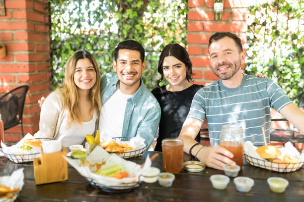 istock Happy Friends At Fast Food Restaurant 1068796224