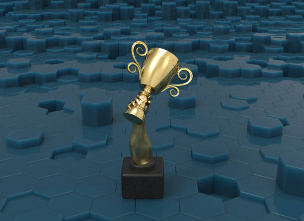 istock 3d render gold champions cup and blue bacground 1068798208