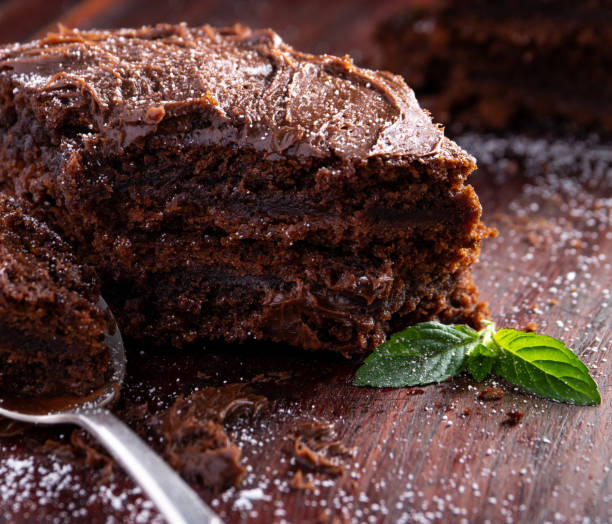 istock Delicious chocolate brownie with a spoon 1068809204