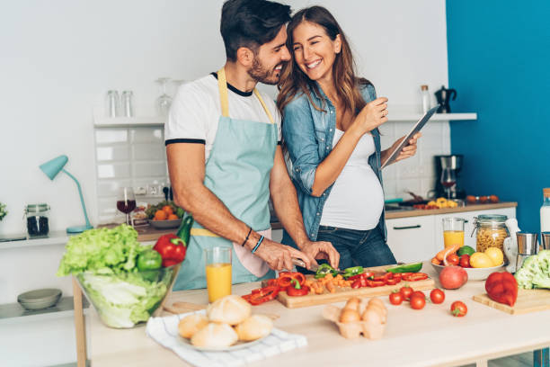 istock Lovely couple expecting a baby 1068812914