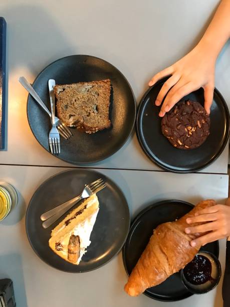 istock Flat lay afternoon coffee break with cake, croissants and cookies 1068814898
